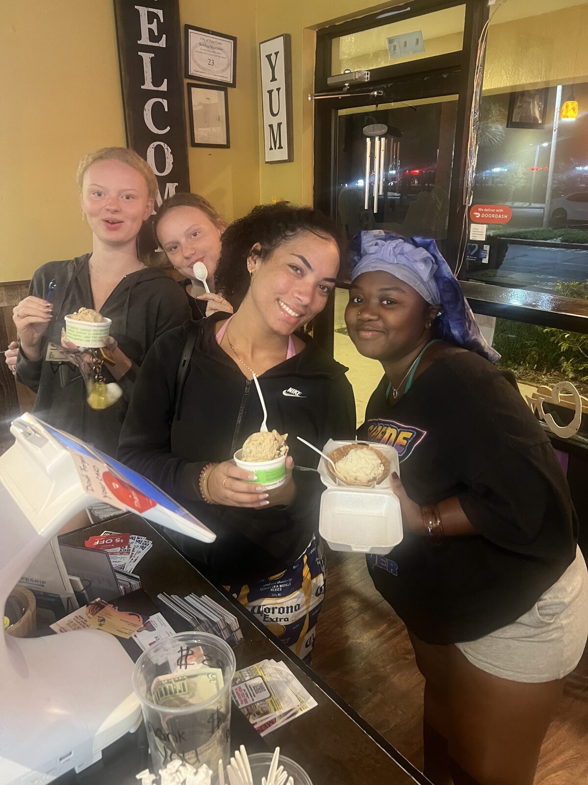 Group of smiling customers with ice cream