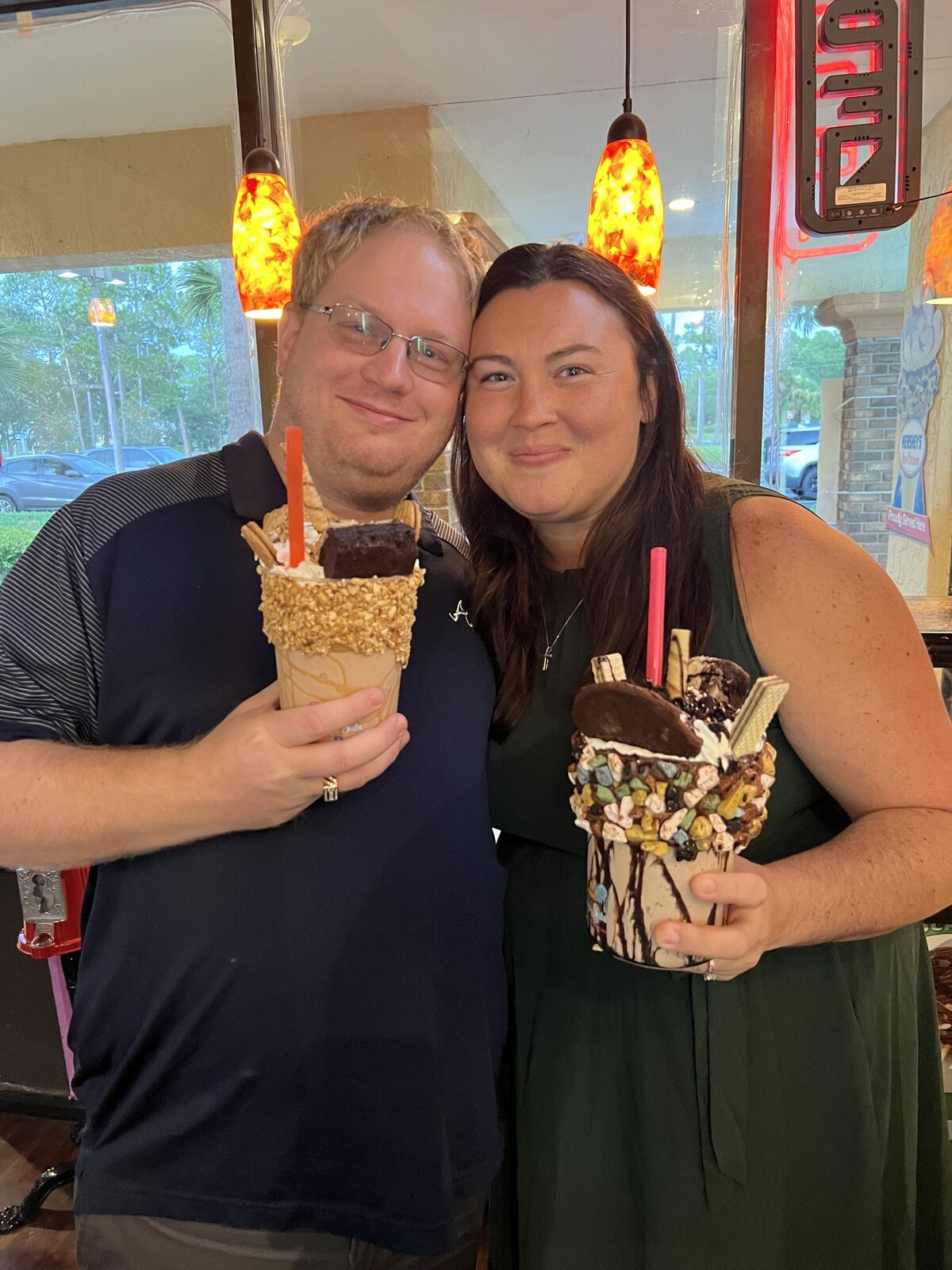 Happy couple enjoying Monster Milkshakes