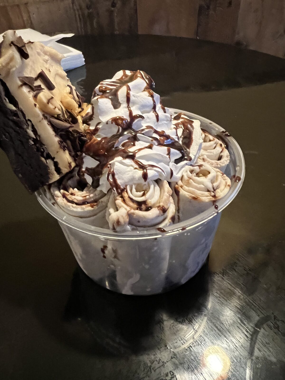 Rolled ice cream with chocolate drizzle